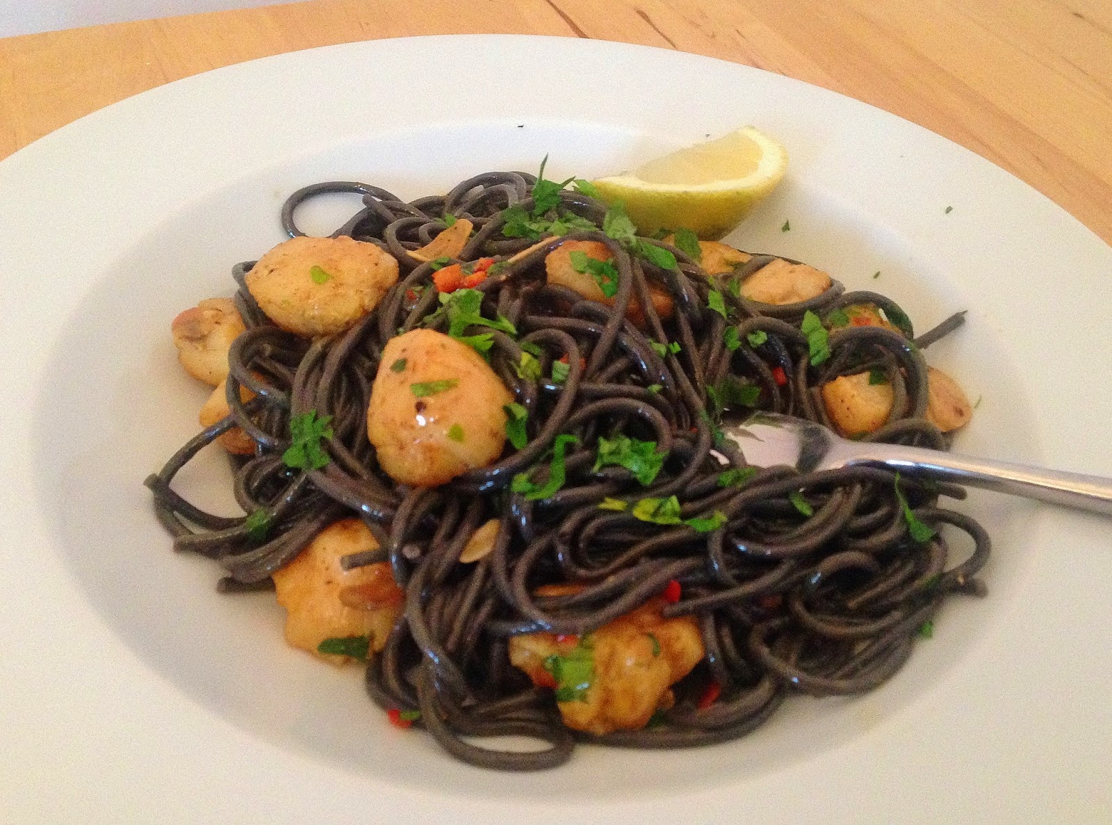 scallops with squid-ink spaghetti