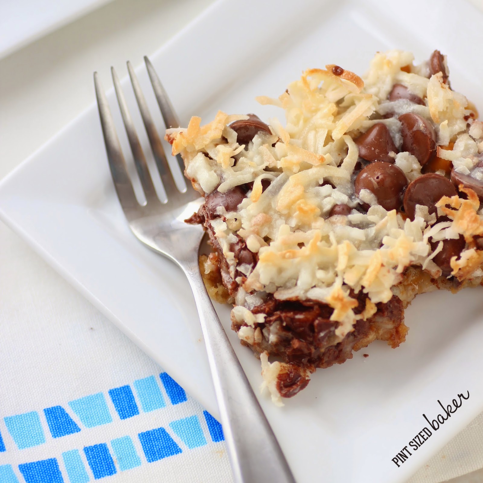 Seven Layer Magic Coconut Bars 3 1%2Bps%2B7%2Blayer%2Bcoconut%2Bbars%2B(24)