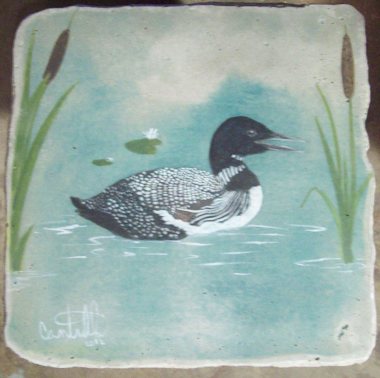 Loons on a concrete Tablel Top