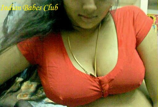 top view of an Indian house wife showing off her deep big boobs and