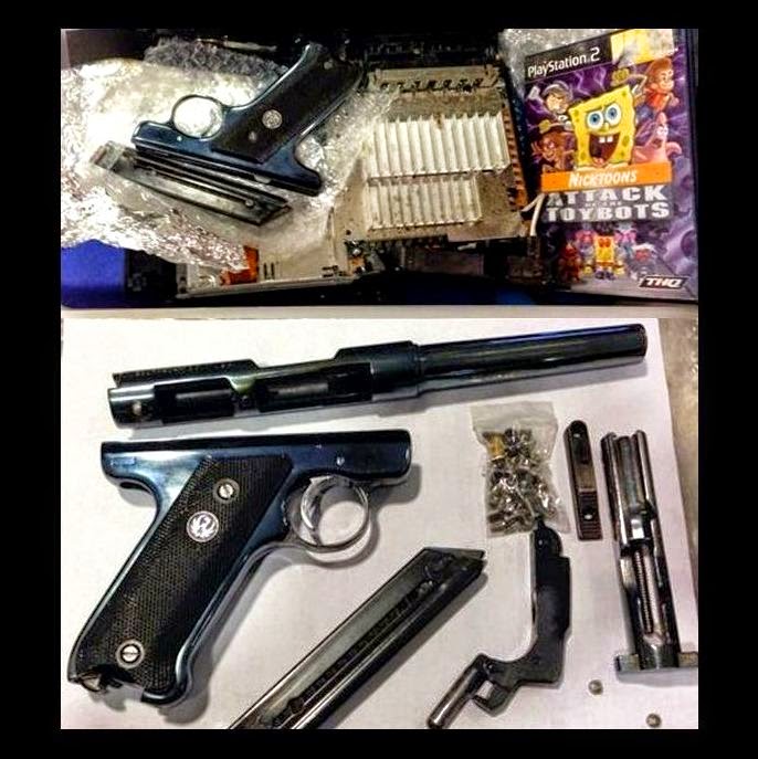 disassembled .22 caliber firearm