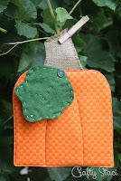 http://craftystaci.com/2015/09/16/hot-pad-of-the-monthseptember-pumpkin/