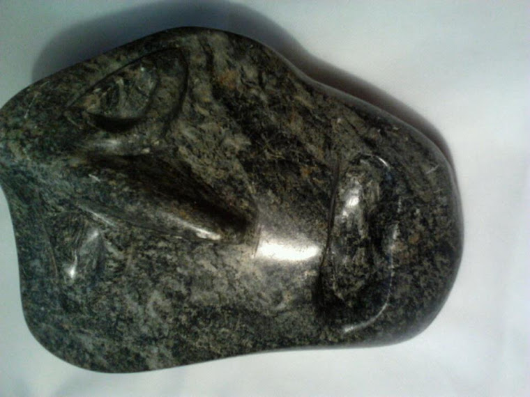 Escultura em Pedra Sabão.