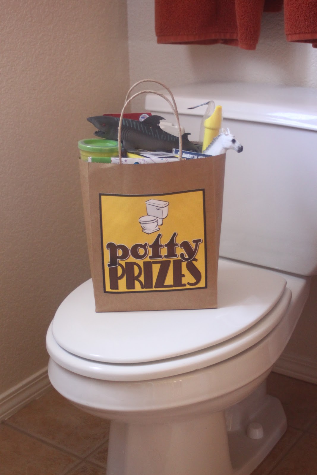 Embellish {free printable} Potty Training Chart & Prize Tag
