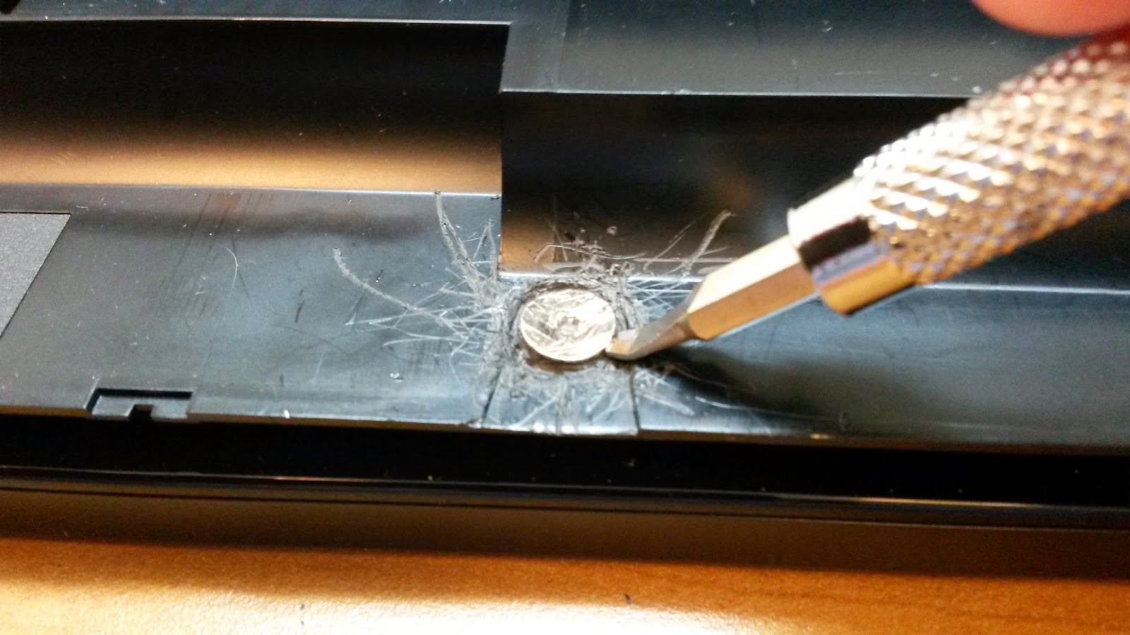 Flybyknight's Blogspot How to Remove a Stripped Screw from a Laptop