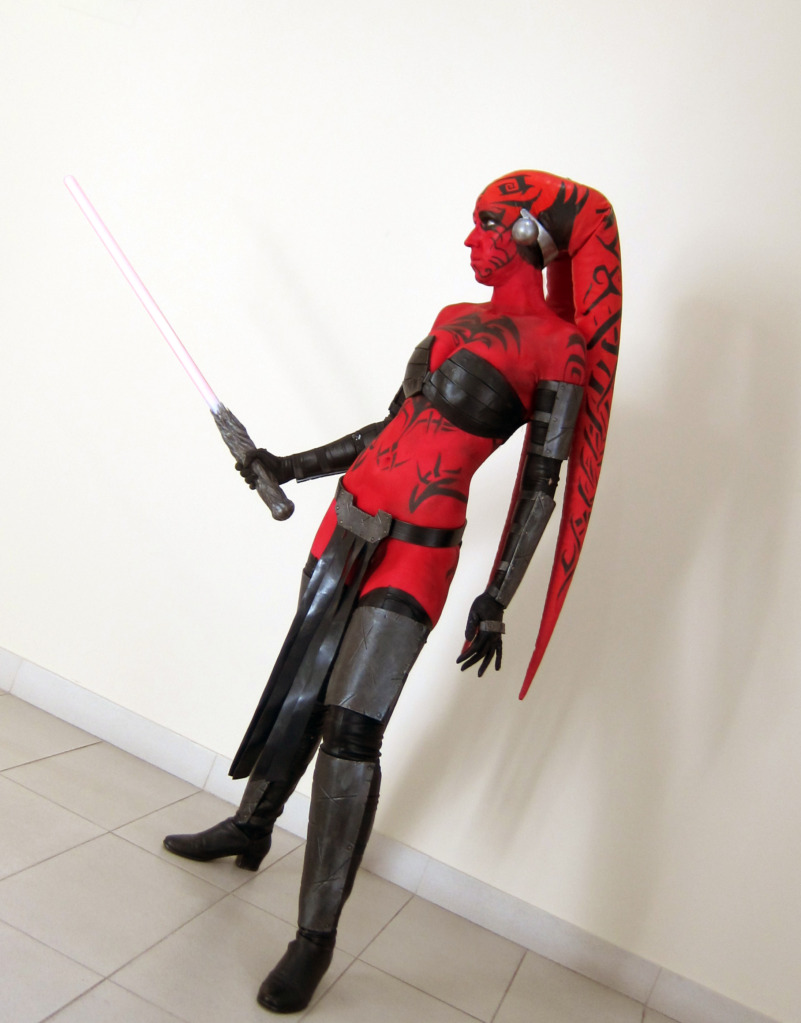 She is dressed (and I use the term loosely haha) as Darth Talon from the St...