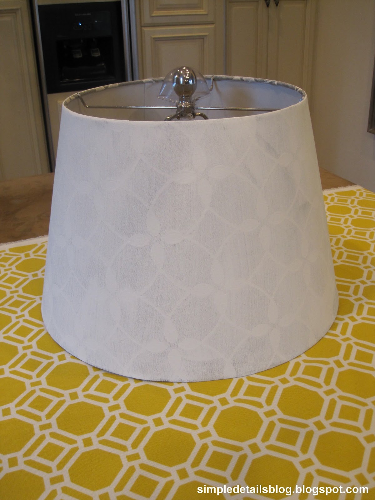 Simple Details how to cover a tapered lamp shade...