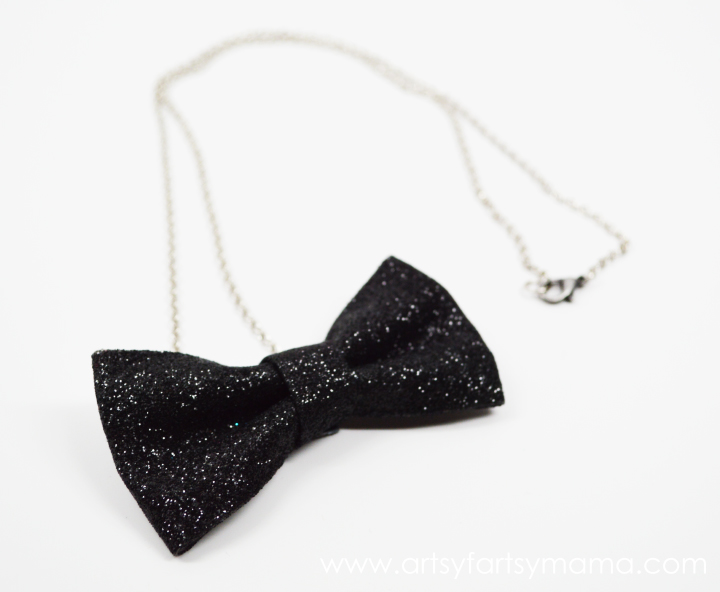 DIY Bow Tie Necklace from artsyfartsymama.com #jewelry #ribbon