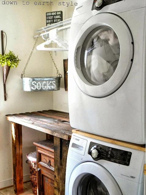 Reclaimed wood laundry room folding table by Down to Earth Style, featured on http://www.ilovethatjunk.com