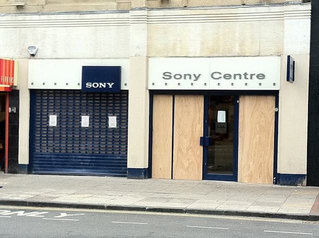a store front with closed doors