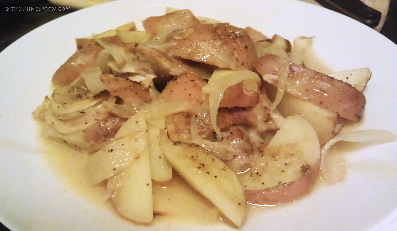 Lemony Garlic Baked Chicken Thighs with New Potatoes & Onions The