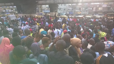 Photos Container falls off bridge crushing vehicles in Ojuelegba