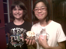 Suzie brings Leah a fancy cupcake