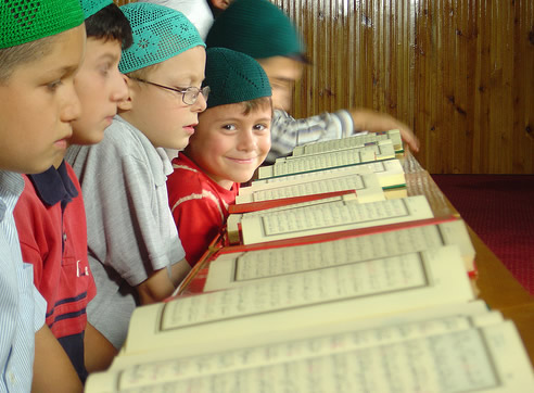 Child Reading Quran