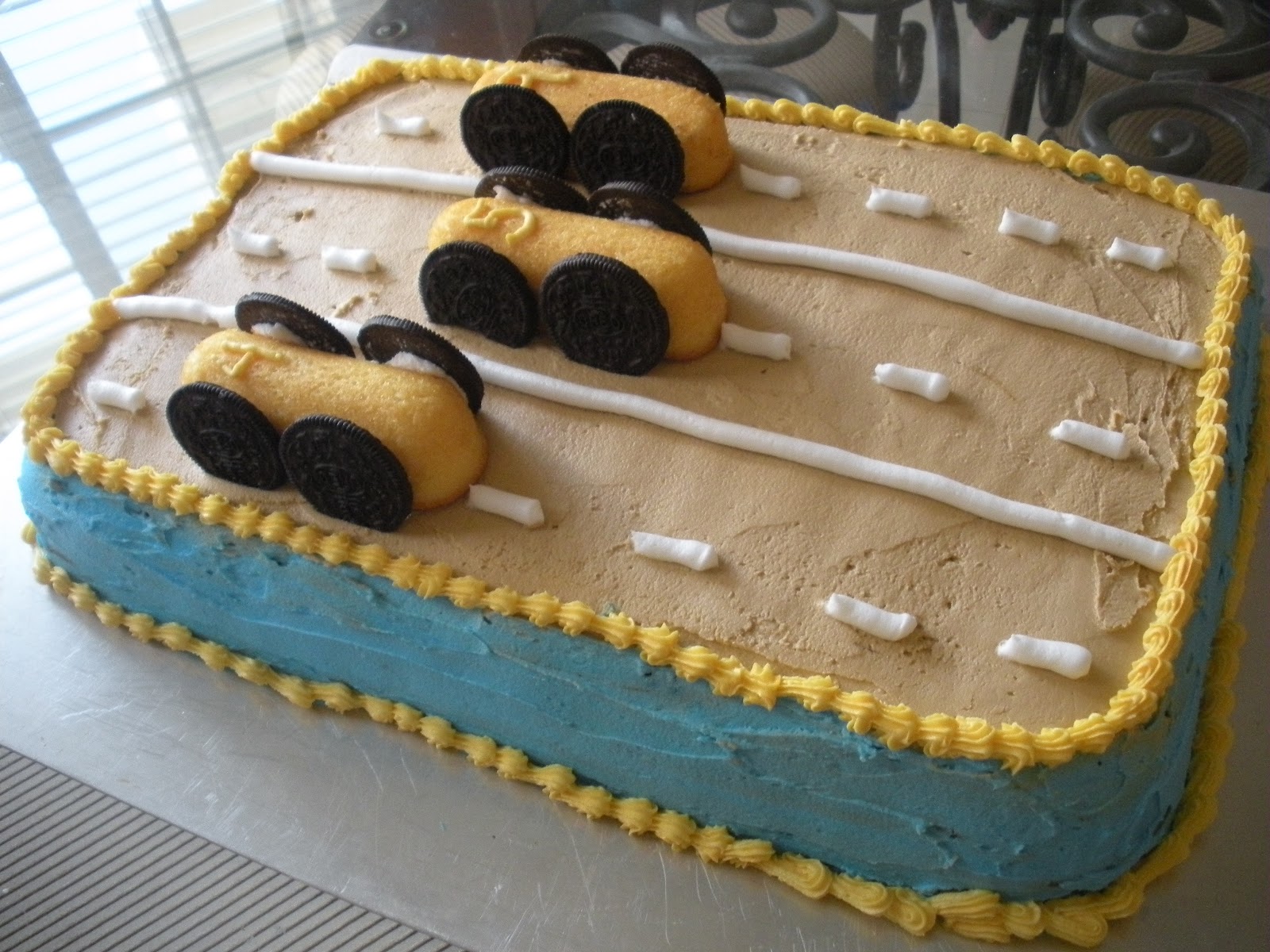 to the Mad House Pinewood Derby Cake