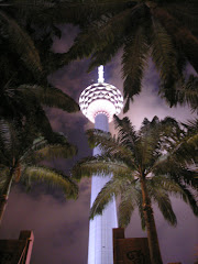 KL Tower with palm trees