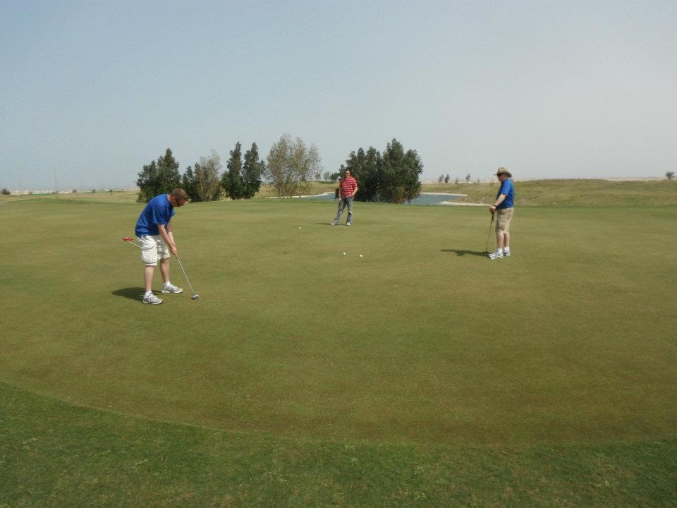 better together. Golfing in Kuwait.