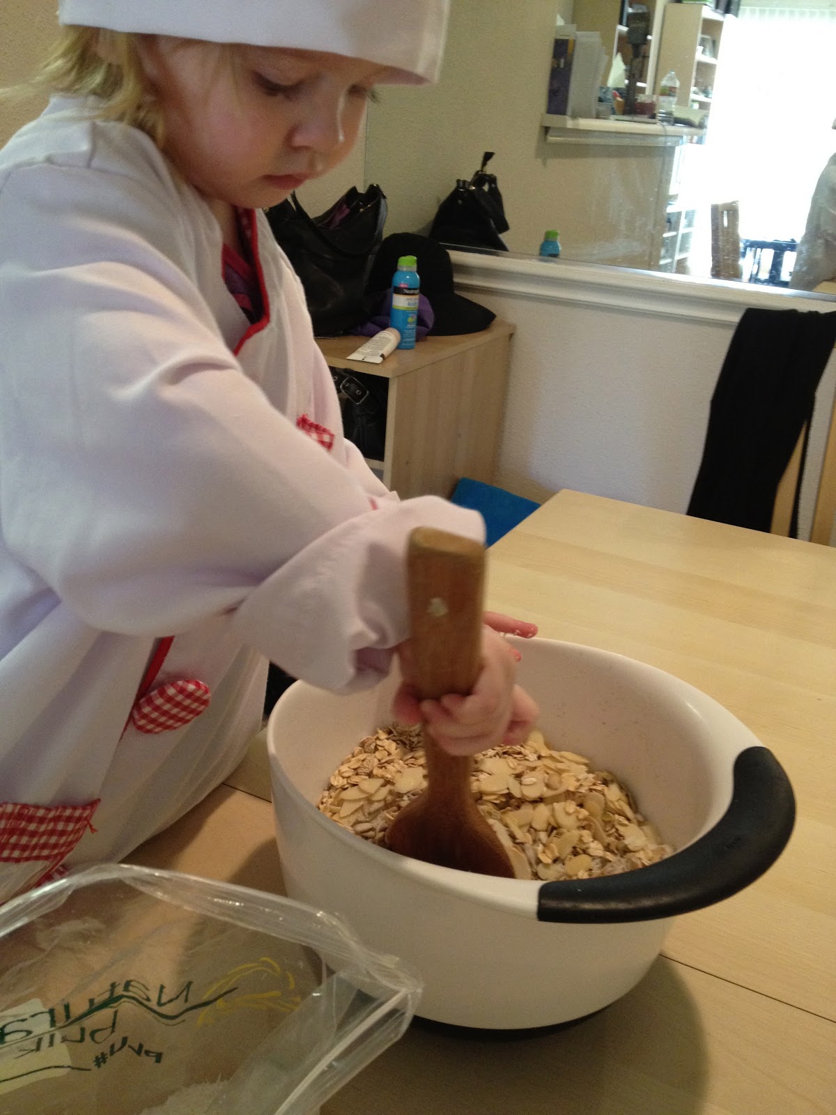Mommy Boler's Kitchen Yummy Granola Enlisting the help of a toddler