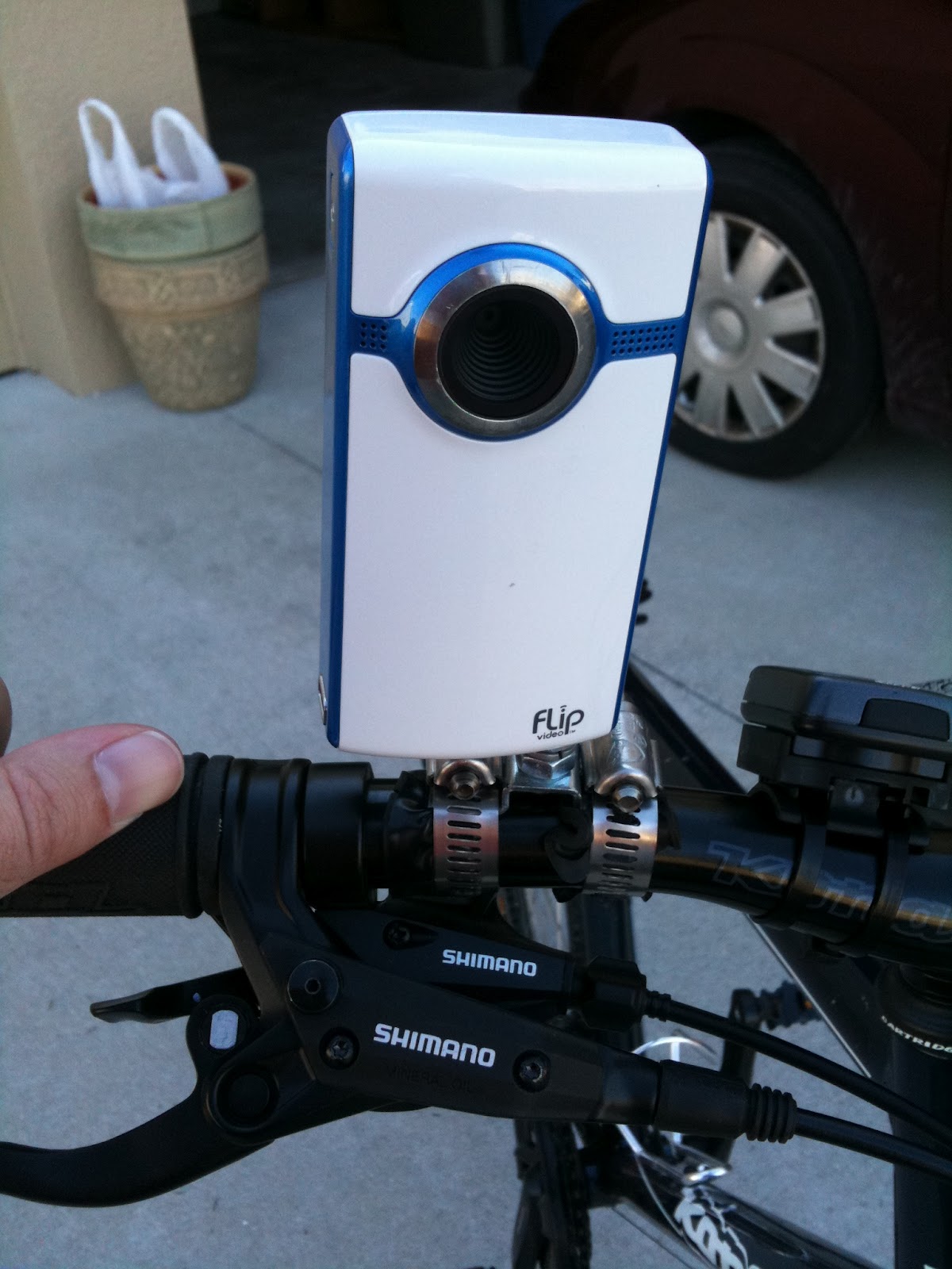 Adventures in Ham Radio OffTopic Mount Flip Camera to Bicycle Handlebars