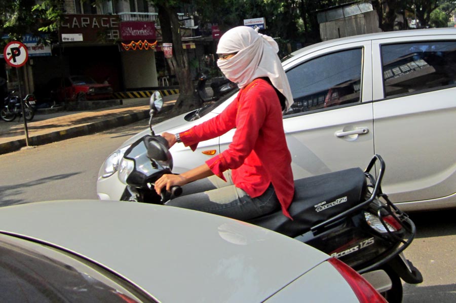 Image result for girls cover their faces while driving