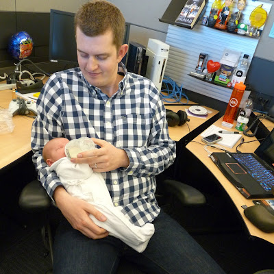 Daddy feeding Freddie at work