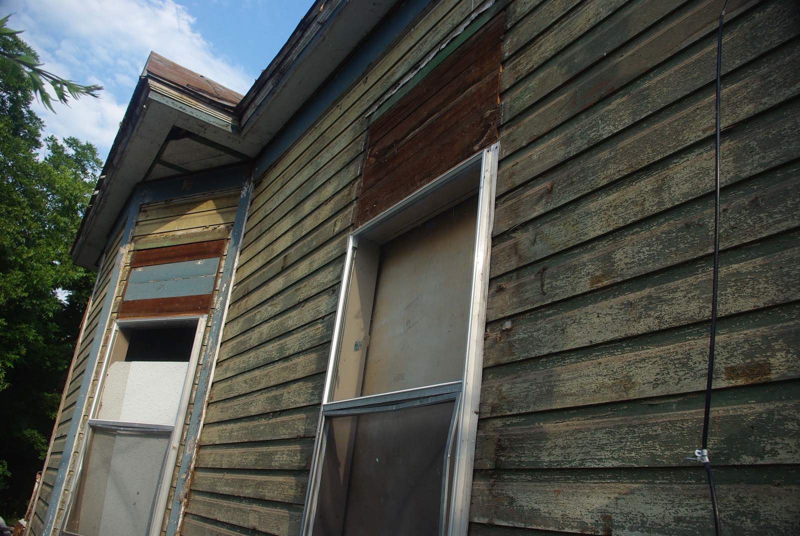 Dignowity Hill RestorationAnother Old House Removing the Vinyl Siding