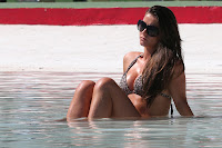 Brooke Vincent hot in bikini and sunglasse relaxing in the pool