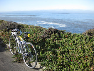 Bicycle next to ice plant on a Pacific coast cliff at Granite Canyon