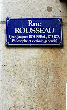 li dû şûnşopên berî xwe; navê Jean-Jacques Roussaeu li yek ji kolana herî livgîn a Genéveê.