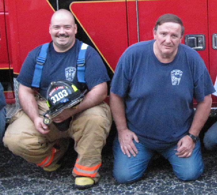 Left to Right- Jon Mathes and Ken Bescoe with the not needed BLVFD squad truck.