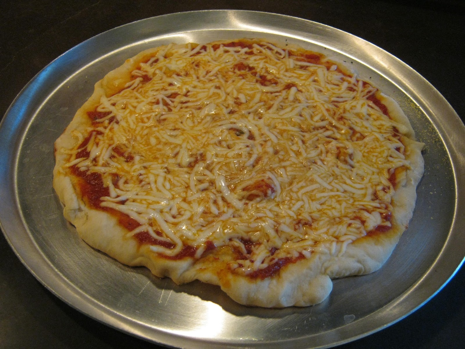 Let the Feasty Begin Pizza from the er Kettle Pizza Kit