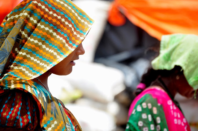 portrait indian tribal woman women girl tarnetar gujarat fair festival colourful face
