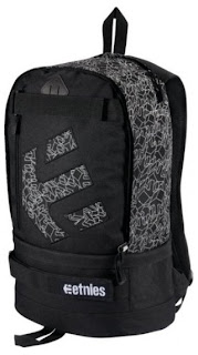 a black backpack with a grey design
