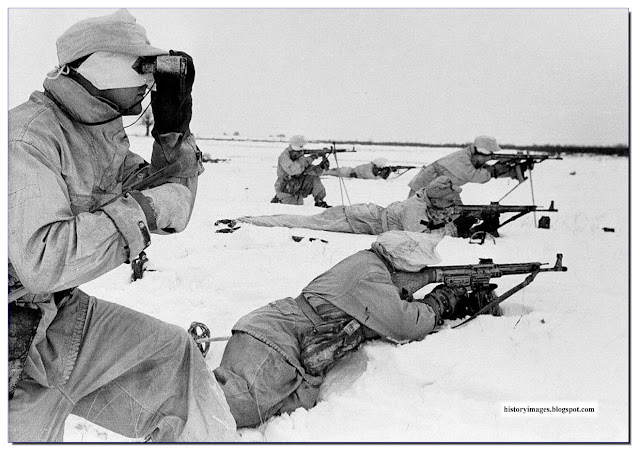 German soldiers, armed with assault rifles, StG-44 near Pripyat, Ukraine. February 1944