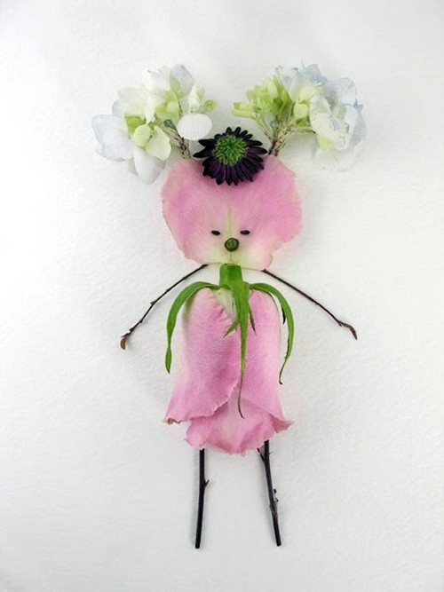 Tạo hình em bé từ hoa lá