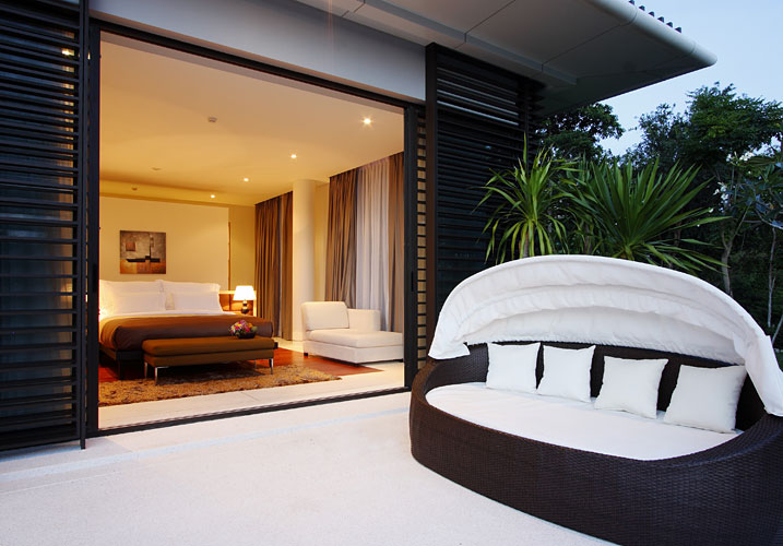 Photo of black and white furniture on the terrace of modern villa in Phuket