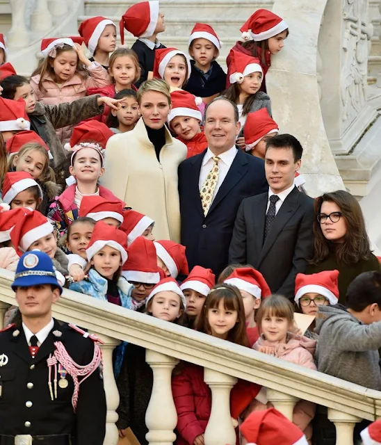 Prince Albert II of Monaco and Princess Charlene of Monaco, Camille Gottlieb and Louis Ducruet attend the Christmas gifts distribution