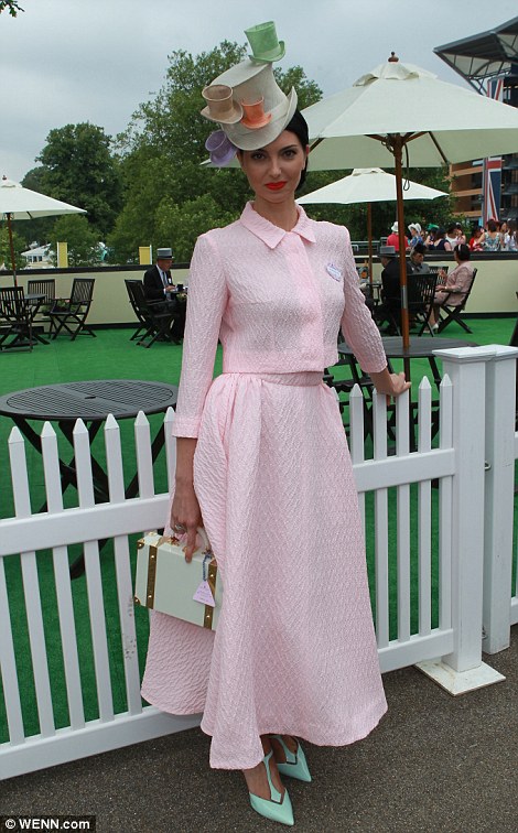 funny light pink outfit with hats on hat on Ladies' Day of Royal Ascot 2014