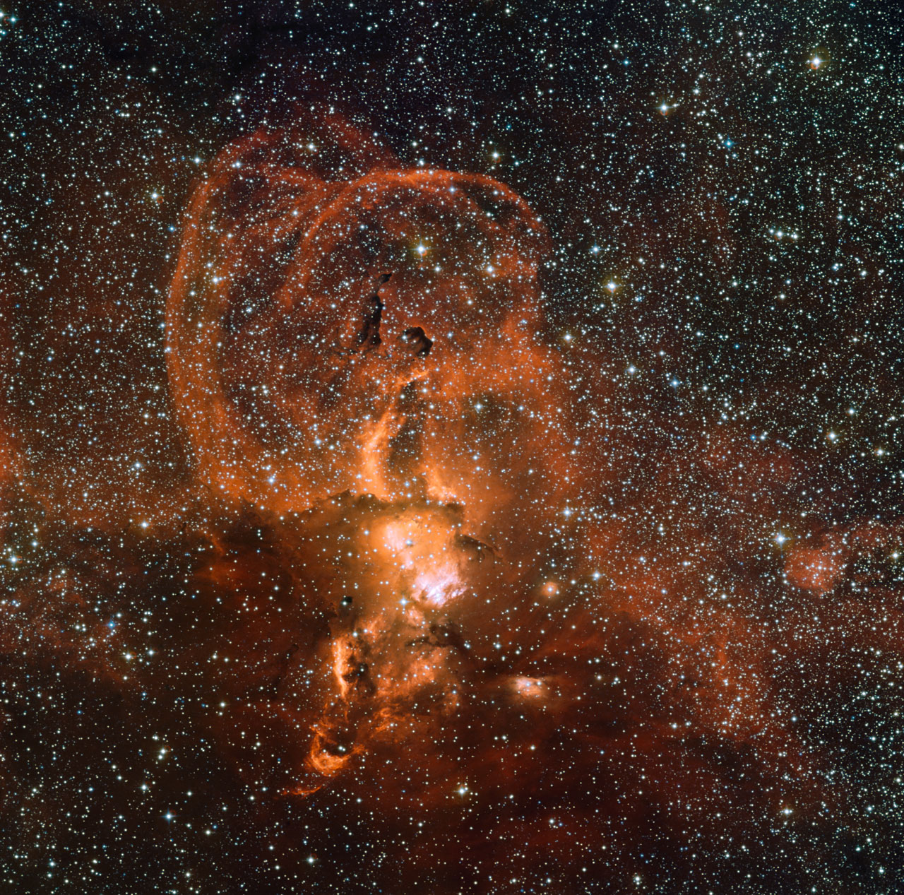 Protostar Blazes Bright, Reshaping Its Stellar Nursery - National