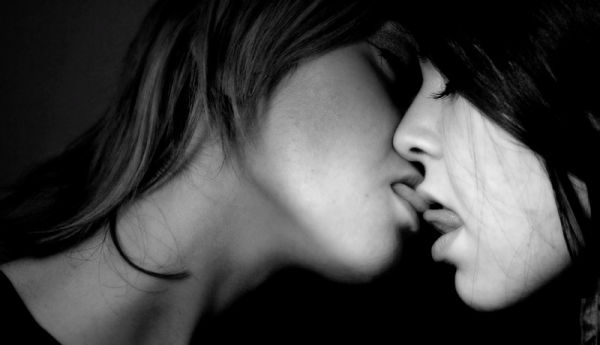 Lesbians kiss and lick each