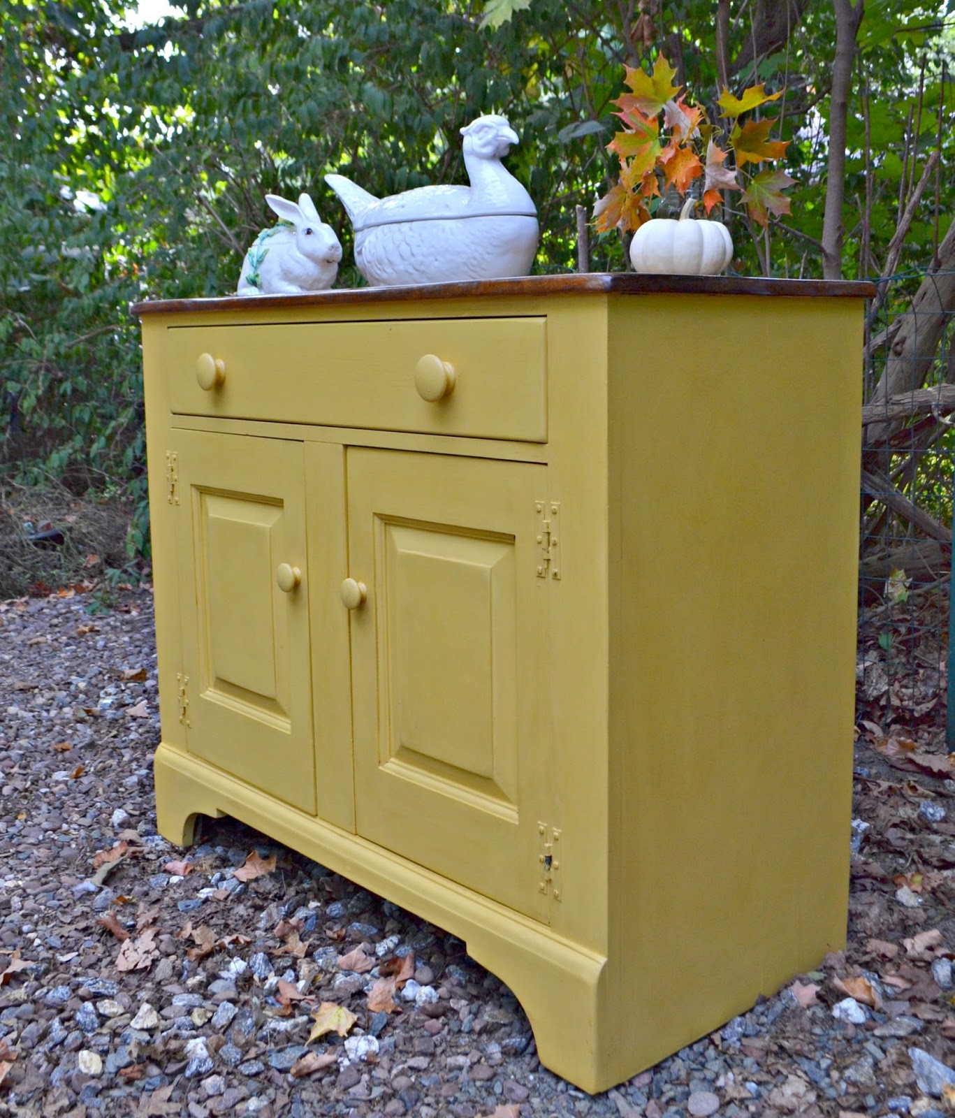 Heir and Space A Vintage Cupboard in Buttercream Yellow