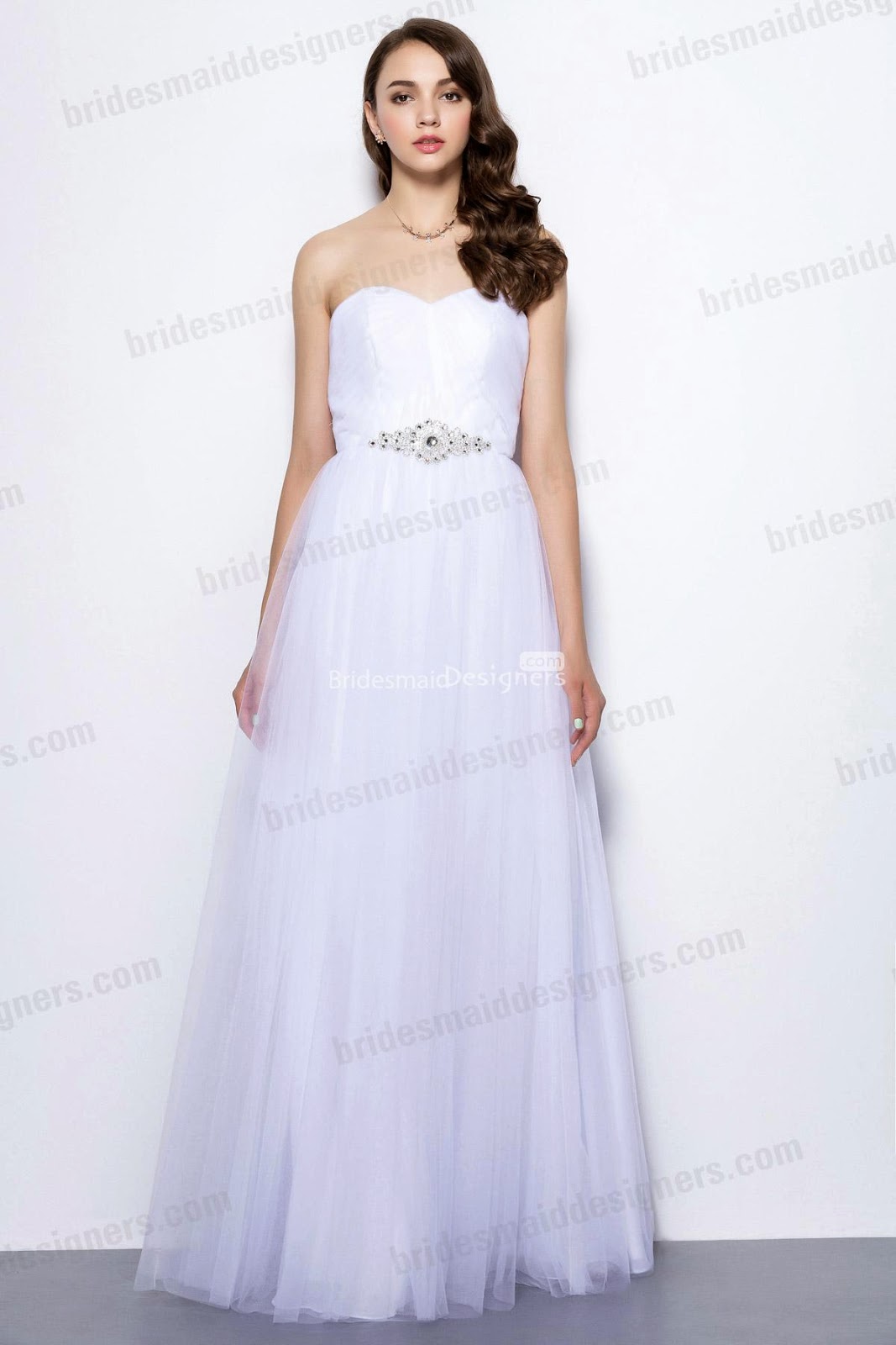 http://www.bridesmaiddesigners.com/strapless-sweetheart-beaded-low-back-white-tulle-long-bridesmaid-dress-1054.html