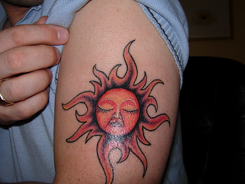 Sun face tattoo design