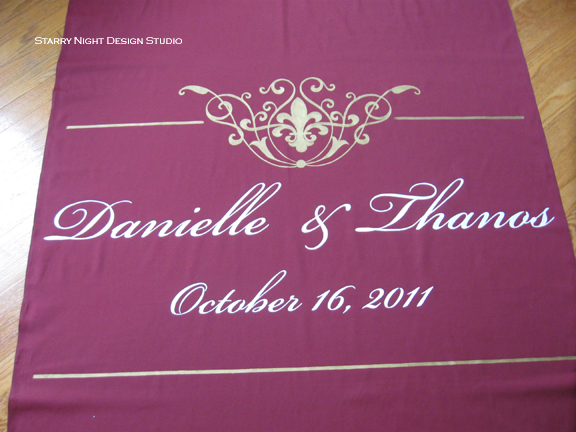 Danielle's beautiful burgundy and gold wedding aisle runner