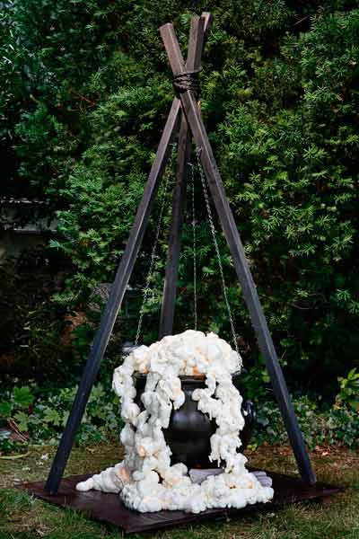 buy a large black plastic cauldron from the halloween store then using a 1 inch spade bit drill a hold in the back - Halloween Store New Jersey buy a large black plastic cauldron from the halloween store then using a 1 inch spade bit drill a hold in the back - Halloween Store New Jersey