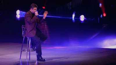 George Michael singing on a stool. London, 2008.