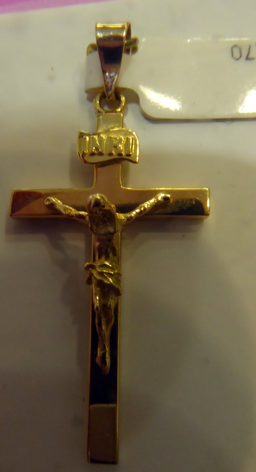 Cruz de oro para comunión