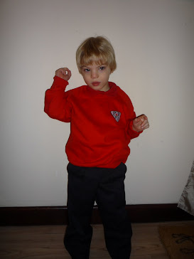Nathaniel's first day at school - hes leaning against the wall!
