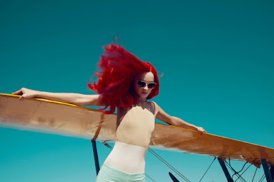 woman flying airplane, airport, fashion photographer los angeles, LA