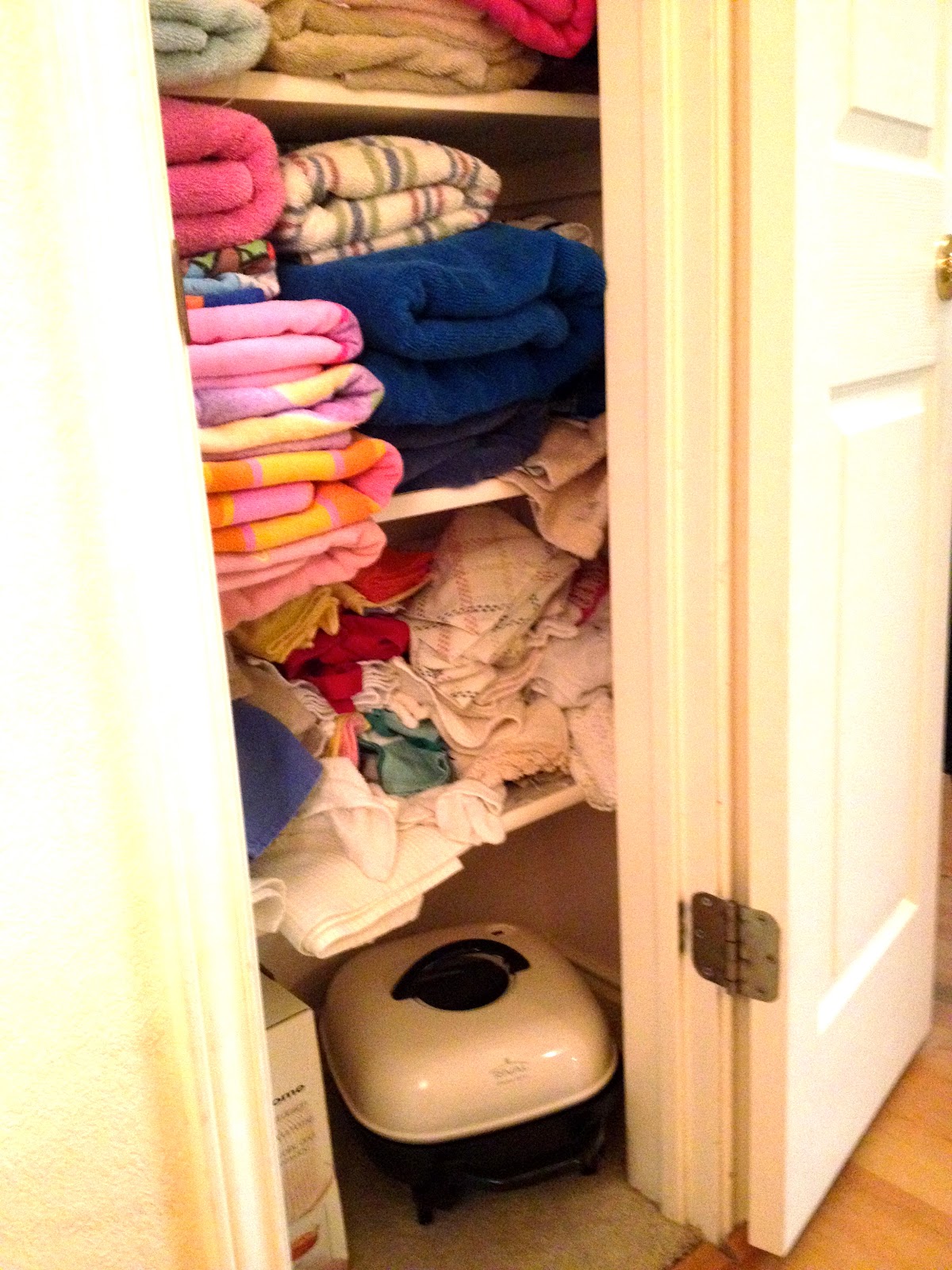 Pink Texas Chick Organized Linen Closet... Finally!